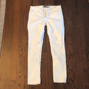 Levi’s white Demi Curve, low rise skinny jeans
